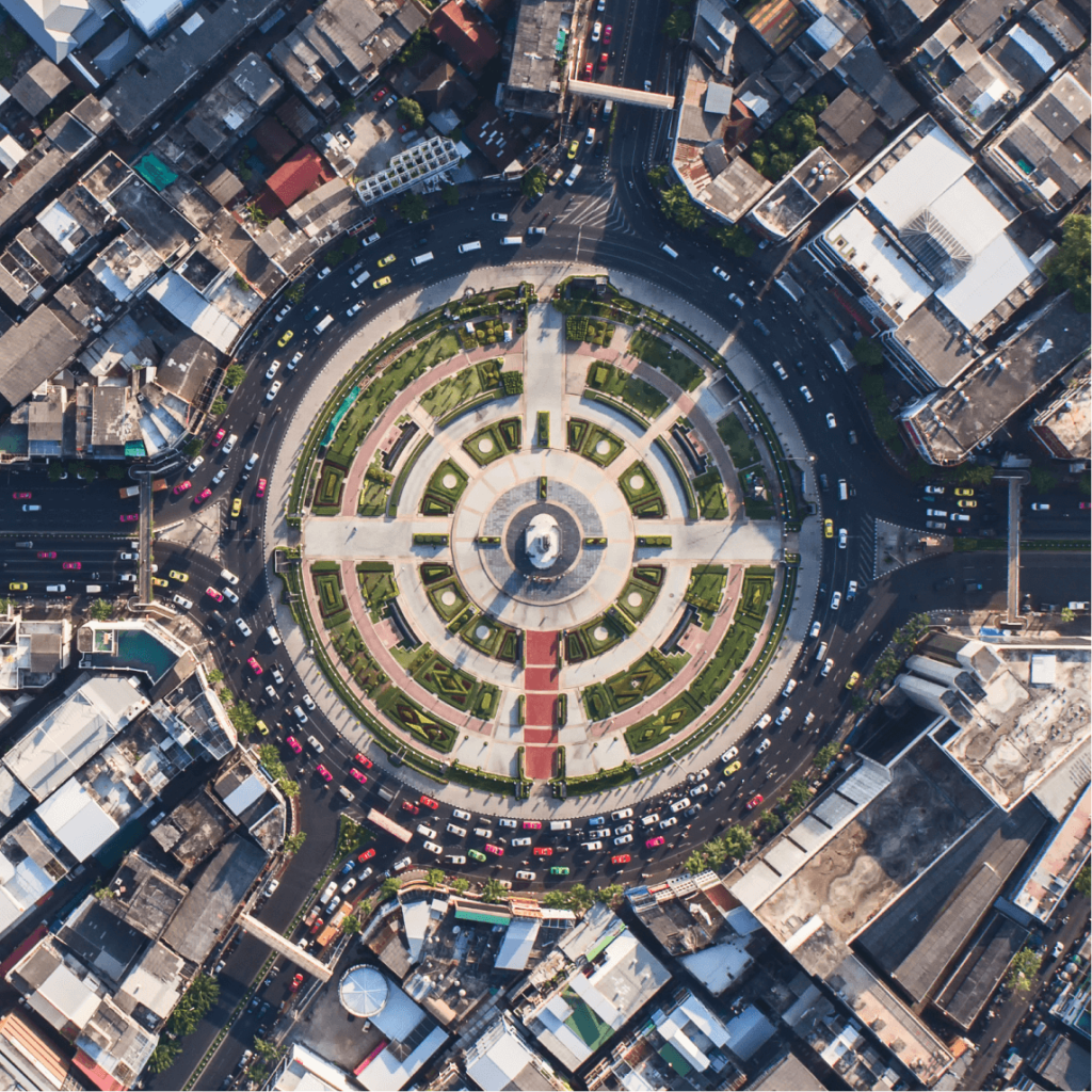 Aerial view of a major traffic circle within a large city signifying the need for crisis communications solutions.