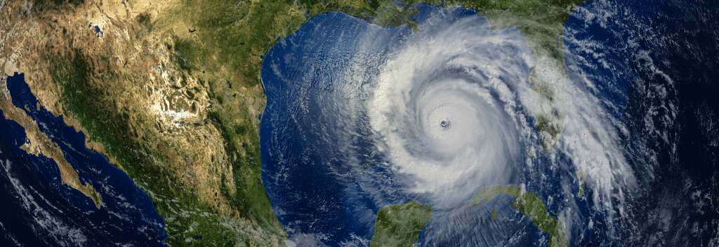 Satellite image of a hurricane in the Gulf of Mexico as teams prepare for crisis management.