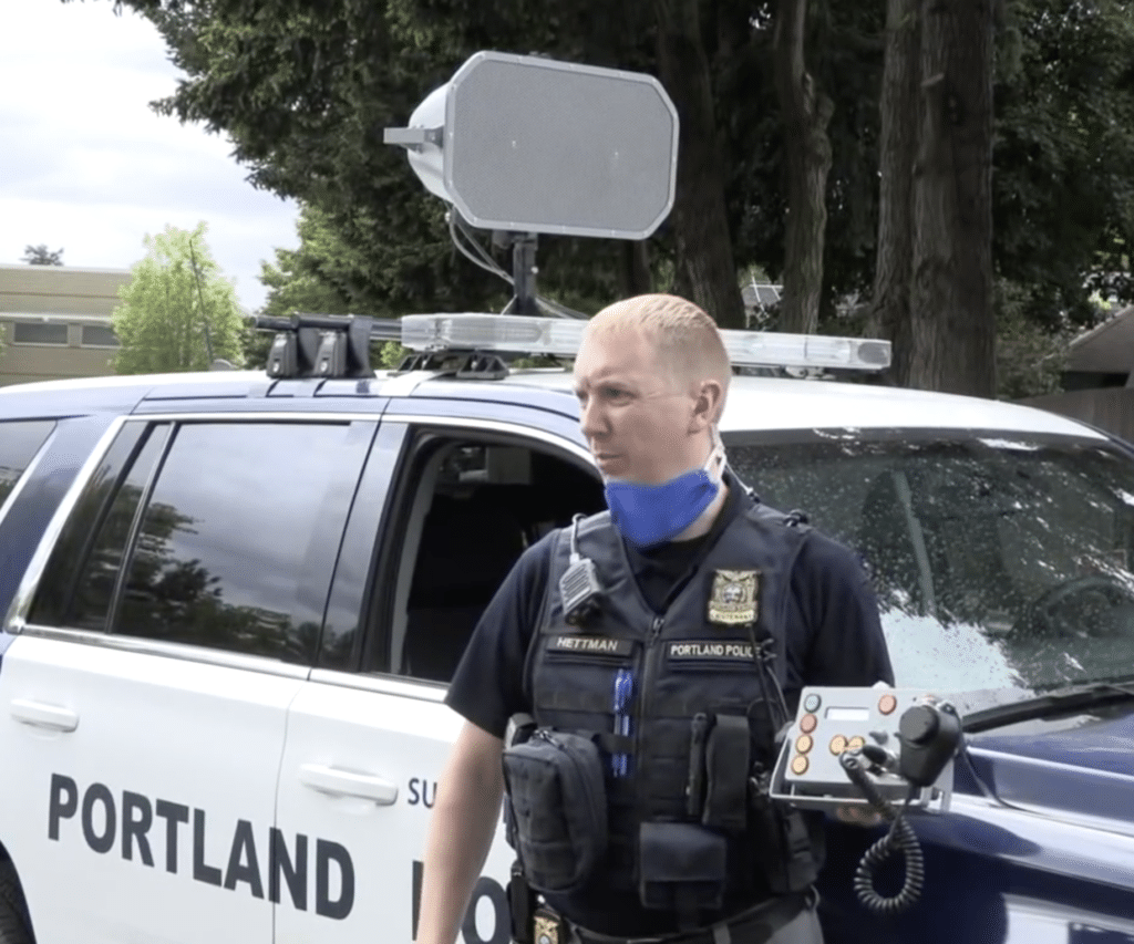 Portland PD with LRAD speakers mounted on a police vehicle.